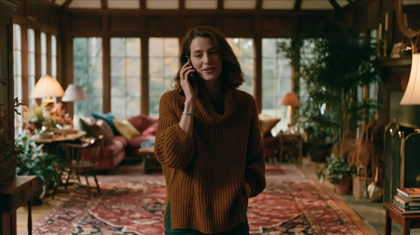 A woman taking a warm call at home