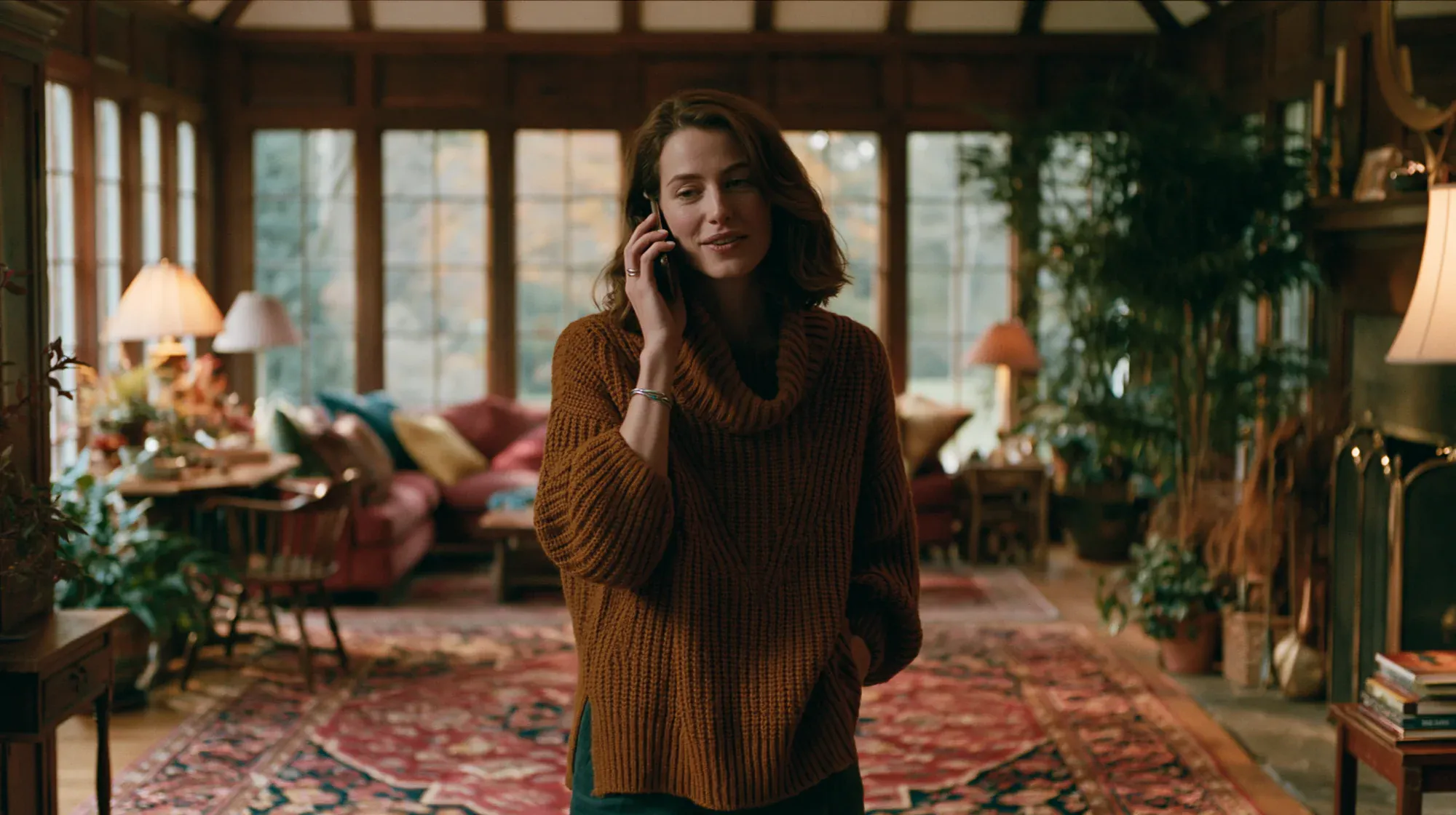 A woman taking a warm call at home